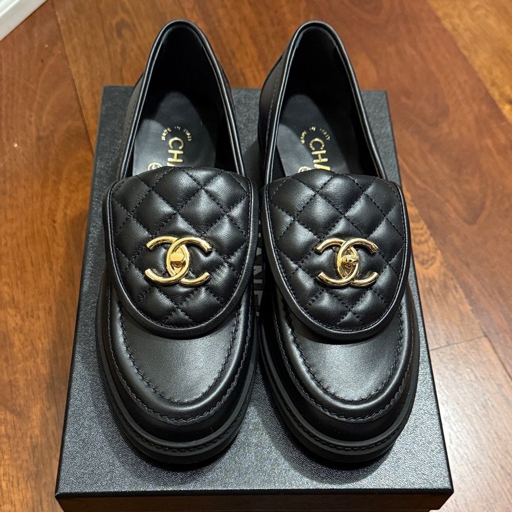 CHANEL Black Quilted Turnlock Loafers